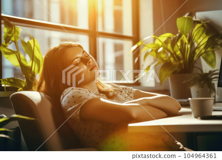 Business woman taking a nap at the company desk 104964361