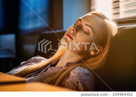 Business woman taking a nap at the company desk Business woman taking a nap at the company desk 104964362