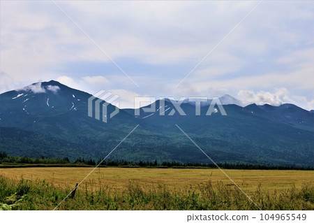 Hokkaido in July, embraced by the bosom of Daisetsuzan National Park, Hokkaido in early summer with a view of Mt. Tokachi, Mt. Furano, Mt. Biei, and Mt. Biei Hokkaido in July, embraced by the bosom of Daisetsuzan National Park, Hokkaido in early summer with a view of Mt. Tokachi, Mt. Furano, Mt. Biei, and Mt. Biei 104965549