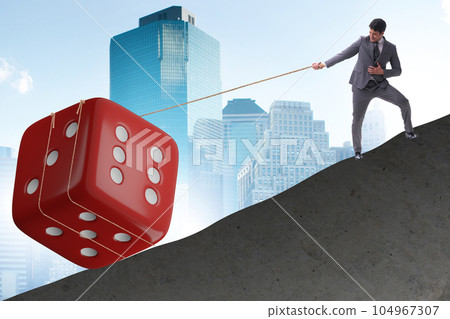 Uncertainty concept with businessman and dice Uncertainty concept with businessman and dice 104967307