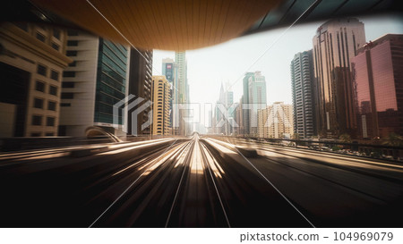 Time Lapse, Timelapse Metro In Dubai, United Arab Emirates. FPV POV At Fast Speed Drive Motion. hyperlapse Tunnel. driverless metro in blurred motion. futuristic city skyline in UAE 104969079