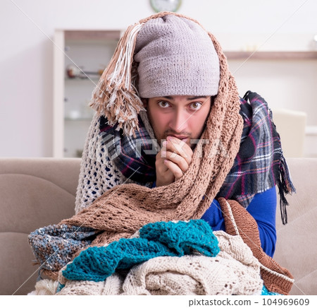 Young man suffering at home Young man suffering at home 104969609