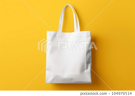Blank white fabric bag mockup, yellow background Blank white fabric bag mockup, yellow background 104970514