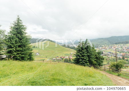 Green Ukrainian mountains. Summer time. Beautiful views of the largest peaks. 104970665