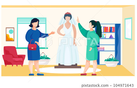 Tailor and customer at bridal salon, fashion atelier studio workshop. Master talking to bride 104971643