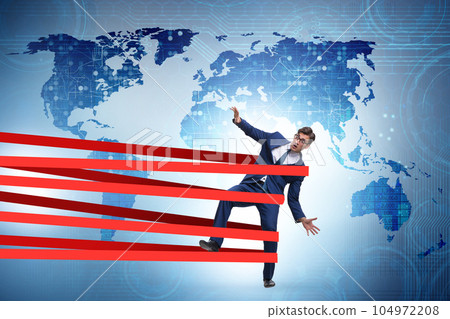 Businessman being harnessed and restricted 104972208