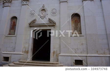 The ancient cathedral of Santa Maria delle Grazie, founded in 1512 in Massa Lubrense. Sorrento Peninsula, Province of Naples, Italy, Europe. 104973748
