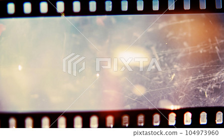 Bright and detailed old film light leak texture background Bright and detailed old film light leak texture background 104973960