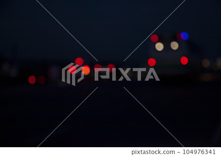 Night city street traffic abstract blurry bokeh lights background Night city street traffic abstract blurry bokeh lights background 104976341