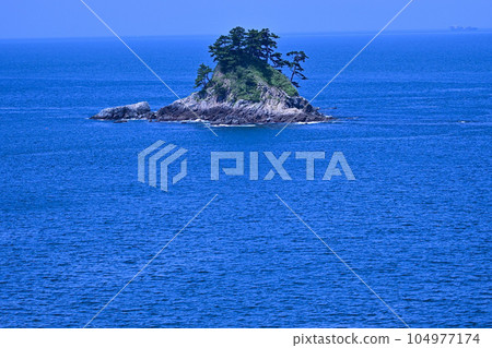 Blue sea and fishing boats 104977174