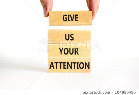 Give us your attention symbol. Concept words Give us your attention on wooden block. Beautiful white table white background. Motivational business give us your attention concept. Copy space. Give us your attention symbol. Concept words Give us your attention on wooden block. Beautiful white table white background. Motivational business give us your attention concept. Copy space. 104980490