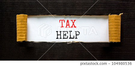 Tax help symbol. Concept words Tax help on a beautiful white paper on a beautiful black background. Business, support and tax help concept. Copy space. 104980536
