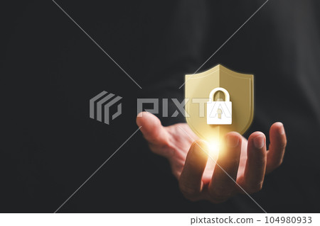 Secure your data with network security and protection concept. Businessman holding shield protect icon on palm symbolizes the importance of cybersecurity and data privacy. Internet network security Secure your data with network security and protection concept. Businessman holding shield protect icon on palm symbolizes the importance of cybersecurity and data privacy. Internet network security 104980933