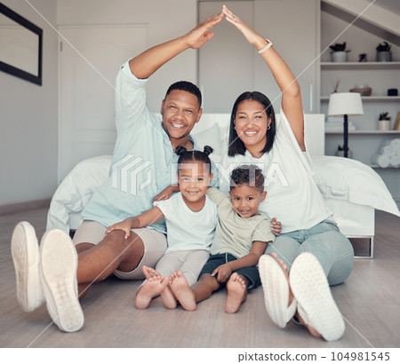 Family, roof and hands together for portrait on bedroom floor for insurance, support bonding and quality time. Security, protection and happy parents with children for love or safety in family home 104981545