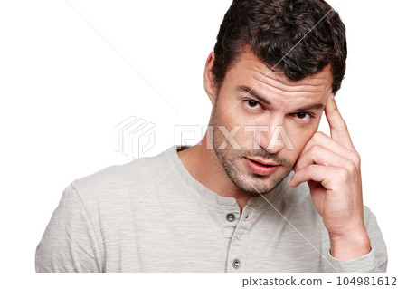 Thinking, fashion and portrait of man on a white background with trendy, stylish and casual clothes. Serious attitude and fashion model isolated in studio with confidence, ideas and thoughtful 104981612