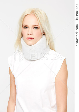 Woman with neck injury, medical brace in studio and neck pain portrait, health insurance isolated on white background. Health, accident and whiplash with recovery, pain and neck brace for healthcare Woman with neck injury, medical brace in studio and neck pain portrait, health insurance isolated on white background. Health, accident and whiplash with recovery, pain and neck brace for healthcare 104981645