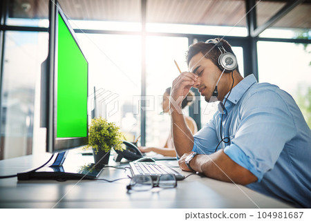 Businessman, call center and headache with green screen in burnout, stress or overworked at office. Man person, consultant or agent with bad head pain or anxiety with mockup chromakey at workplace 104981687
