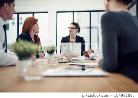 Meeting, planning and business people with laptop in office for creative, collaboration and strategy discussion. Teamwork, brainstorming and designer team sharing goal, vision or design proposal plan 104981853