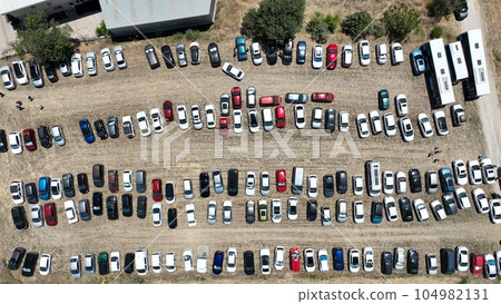 full aerial view of cars in parking lot full aerial view of cars in parking lot 104982131