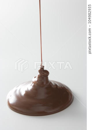 Chocolate dripping 104982935
