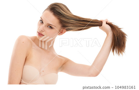Natural beauty, portrait and woman with hair care, shine and grooming routine isolated on white studio background. Female, girl pulling hair and luxury treatment for healthy scalp, salon and wellness Natural beauty, portrait and woman with hair care, shine and grooming routine isolated on white studio background. Female, girl pulling hair and luxury treatment for healthy scalp, salon and wellness 104983161