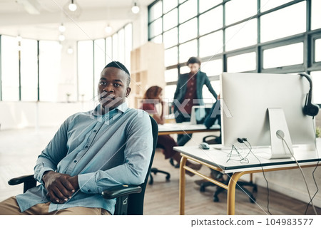 Portrait, pride and black man in chair at office, creative ideas for business project or entrepreneur at design agency. Leader with creativity, idea and African businessman with plan in workspace. Portrait, pride and black man in chair at office, creative ideas for business project or entrepreneur at design agency. Leader with creativity, idea and African businessman with plan in workspace. 104983577