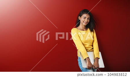 Woman, student and smile portrait with a laptop for university and school work with mockup. Isolated, red background and education work of a young Indian female person with computer for college 104983812