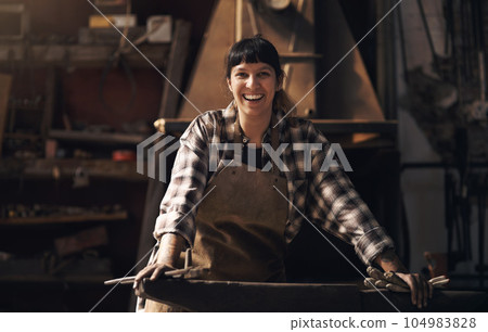 Foundry, warehouse and portrait of woman with tools for industry, manufacturing and manual labor. Industrial factory, welding and female person for steel, iron and metal production for craftsmanship 104983828