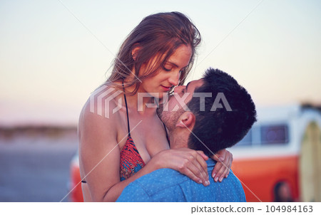 Love, couple and kiss at the beach on date, vacation or road trip in summer with freedom, together and romantic adventure. People, dating and support in relationship, happiness or boyfriend and girl Love, couple and kiss at the beach on date, vacation or road trip in summer with freedom, together and romantic adventure. People, dating and support in relationship, happiness or boyfriend and girl 104984163