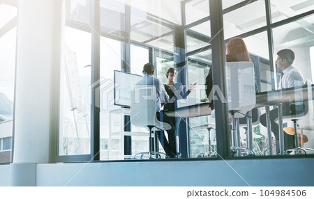 Training, teaching or business people in presentation for sales report or financial analysis in office. Education, leadership or manager planning in a meeting on screen monitor in mentorship coaching Training, teaching or business people in presentation for sales report or financial analysis in office. Education, leadership or manager planning in a meeting on screen monitor in mentorship coaching 104984506