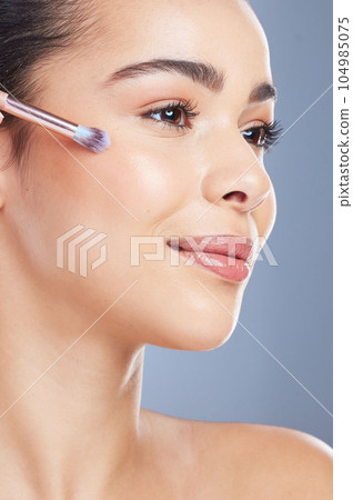 Cosmetic, profile and woman with makeup brush for natural, glamour and facial routine in studio. Self care, beauty and young female model from Brazil with cosmetology face isolated by gray background Cosmetic, profile and woman with makeup brush for natural, glamour and facial routine in studio. Self care, beauty and young female model from Brazil with cosmetology face isolated by gray background 104985075