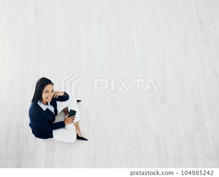 Happy business woman, mockup space and above for communication or networking at the office. Portrait of female person or employee smile with mobile smartphone app for social media at the workplace Happy business woman, mockup space and above for communication or networking at the office. Portrait of female person or employee smile with mobile smartphone app for social media at the workplace 104985242