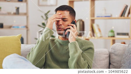 Angry, man and phone call communication in home with anger problem, stress and conflict on sofa lounge. Frustrated male person, smartphone and talking for mobile conversation, argument and complaint Angry, man and phone call communication in home with anger problem, stress and conflict on sofa lounge. Frustrated male person, smartphone and talking for mobile conversation, argument and complaint 104985622