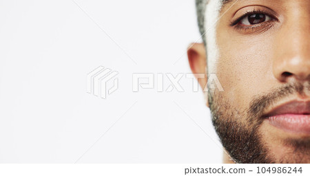 Face, closeup and man in studio for skincare, against white background. Zoom and serious man portrait of Indian male model excited for wellness, beauty and cosmetic care while isolated Face, closeup and man in studio for skincare, against white background. Zoom and serious man portrait of Indian male model excited for wellness, beauty and cosmetic care while isolated 104986244