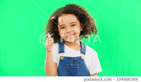 Happy, green screen and face of a child with a thumbs up isolated on a studio background. Winning, success and portrait of a girl kid with an emoji hand gesture for motivation, yes and agreement Happy, green screen and face of a child with a thumbs up isolated on a studio background. Winning, success and portrait of a girl kid with an emoji hand gesture for motivation, yes and agreement 104986309