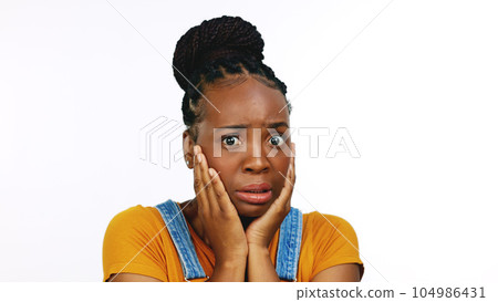 Scared, shock and confused with face of black woman for announcement, gossip and news. Fear, secret and surprise with portrait of girl and omg expression for frightened, notification or wow in studio 104986431