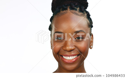 Face, smile and laughter with a black woman in studio isolated on a white background for fun or humor. Portrait, happy and laughing with an attractive young female enjoying a joke or funny meme Face, smile and laughter with a black woman in studio isolated on a white background for fun or humor. Portrait, happy and laughing with an attractive young female enjoying a joke or funny meme 104986433