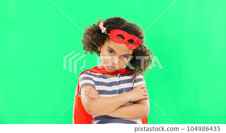 Child, superhero and hand on green screen to stop crime and fight with fantasy, dream or cosplay costume. Girl power, hero and pretend game with strong kid portrait to protect freedom of imagination 104986435