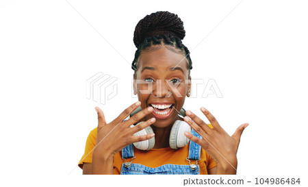 Black woman, studio and excited face with hand gesture, fashion or smile by isolated white background. Happy gen z model, african girl or funny hands for comic laugh, playful or crazy with headphones Black woman, studio and excited face with hand gesture, fashion or smile by isolated white background. Happy gen z model, african girl or funny hands for comic laugh, playful or crazy with headphones 104986484
