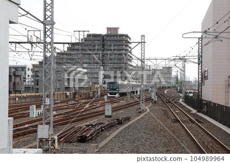 A train leaving Myoden Station on the Tokyo Metro Tozai Line A train leaving Myoden Station on the Tokyo Metro Tozai Line 104989964