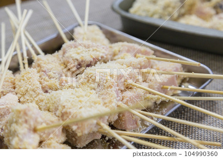 Preparing Kushikatsu Deep-fried Skewers Preparing Kushikatsu Deep-fried Skewers 104990360