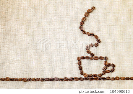 Burlap Sackcloth Canvas and Coffee Beans Photo Background. Copy Space. Coffee Border 104990613