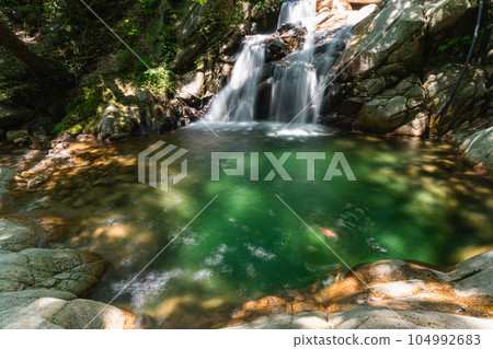 Mitakigawa Valley in summer, clear stream Touramichi Falls 104992683