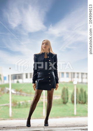 Full length portrait of confident woman 104994013