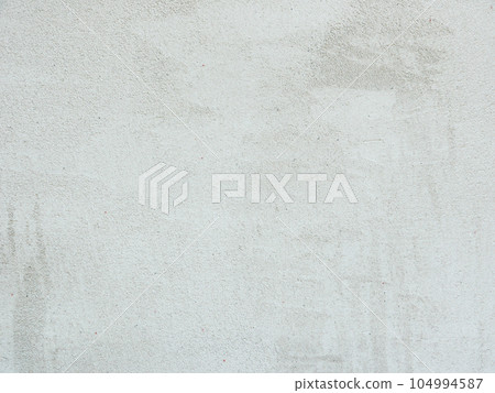Abstract background of old gray plaster. Abstract background of old gray plaster. 104994587