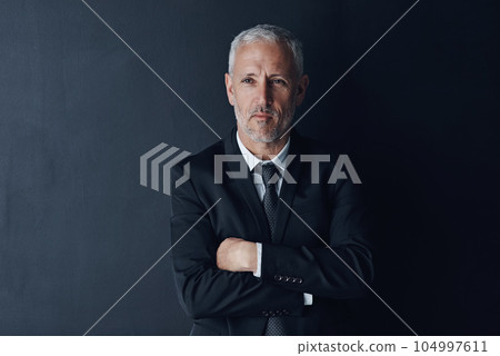 Arms crossed, senior and vision of business man in studio for financial advisor, corporate or manager. Boss, accounting and idea with ceo thinking on black background for executive and mockup space Arms crossed, senior and vision of business man in studio for financial advisor, corporate or manager. Boss, accounting and idea with ceo thinking on black background for executive and mockup space 104997611
