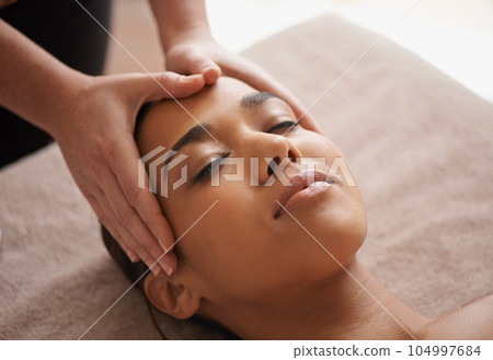 Girl, hands or head massage to relax in spa for zen resting, sleeping wellness or luxury physical therapy. Face of woman in salon to exfoliate for facial healing treatment, beauty or holistic detox Girl, hands or head massage to relax in spa for zen resting, sleeping wellness or luxury physical therapy. Face of woman in salon to exfoliate for facial healing treatment, beauty or holistic detox 104997684