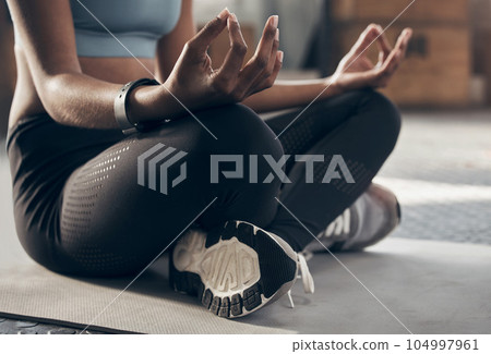 Hands, yoga lotus and gym with woman on floor for self care, training and fitness with mindfulness. Girl, zen meditation and peace with mindset, workout and relax with breathing exercise for health 104997961