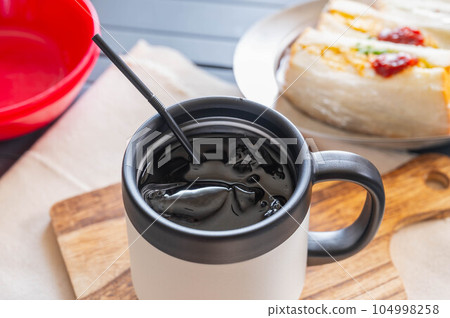 iced coffee outdoors iced coffee outdoors 104998258