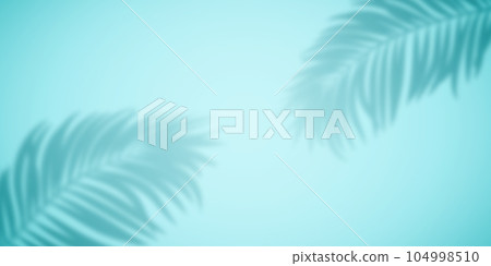 Shadow from palm leaves on a turquoise background. Shadow from palm leaves on a turquoise background. 104998510